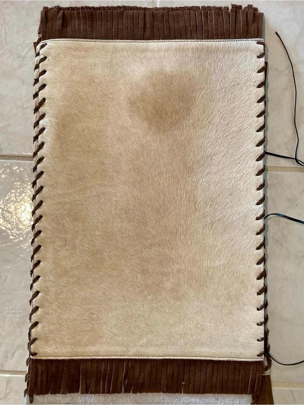 NWT Dekoland plain laced cowhide and suede fringe placemat set